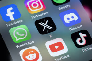 New social media apps formerly twitter  x and threads on smart phone screen